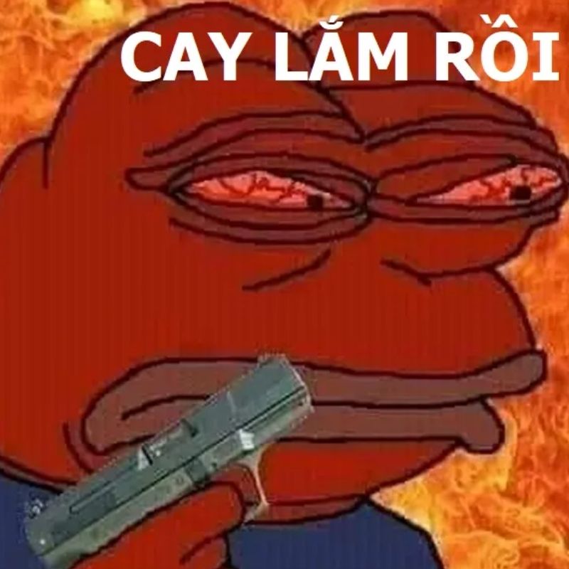 Nhân vật ếch Pepe màu đỏ đang cầm súng giữa biển lửa kèm dòng chữ cay lắm rồi